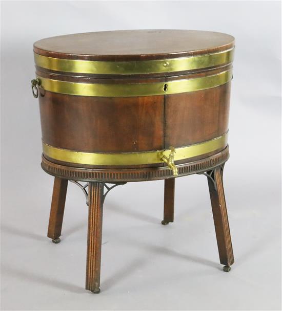 A George III brass banded mahogany oval wine cooler, W.2ft 1in. D.1ft 6in. H.2ft 4in.